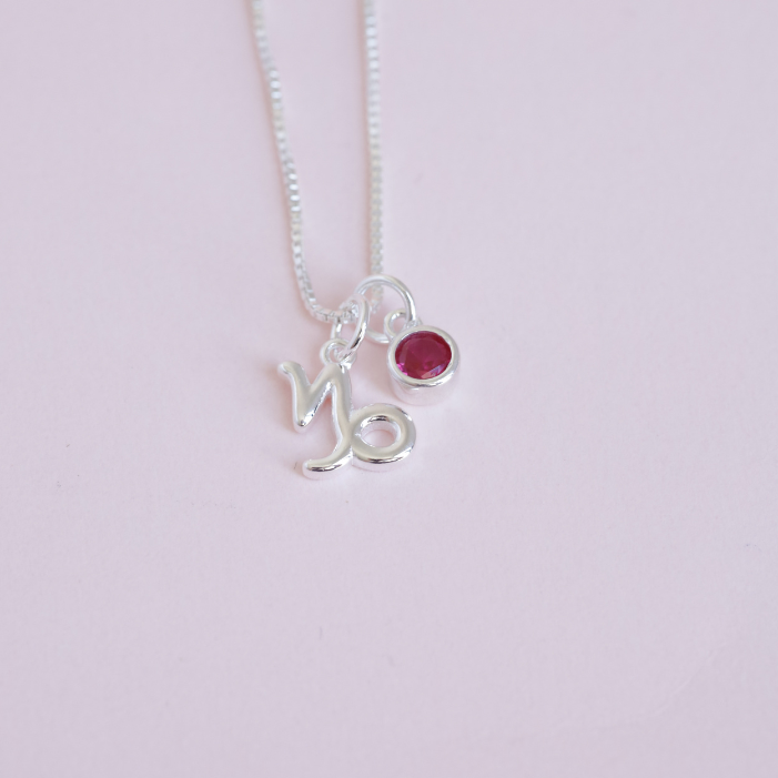 Collar Capricornio Fucsia